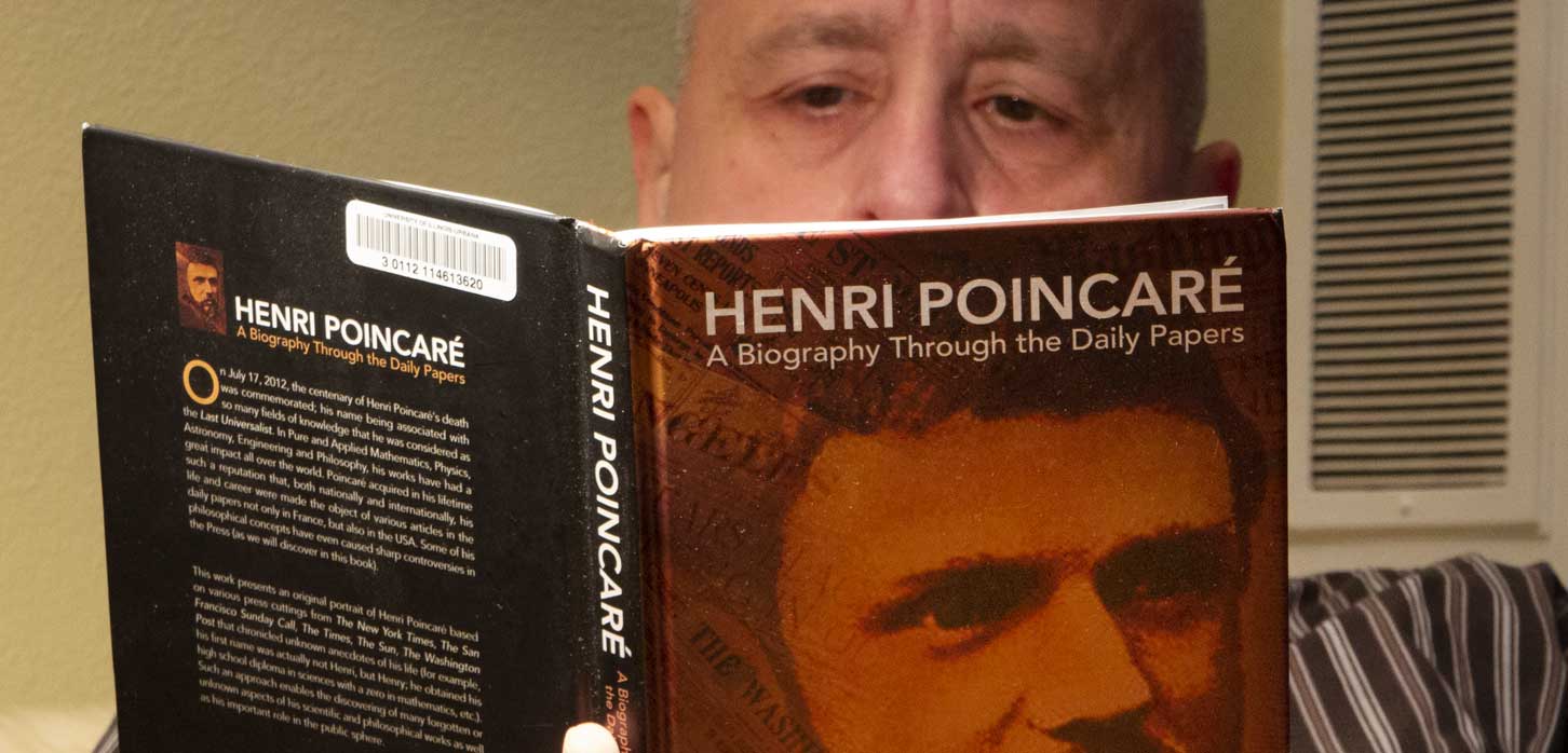 Science Advisor Michael Trott reading about Henri Poincaré